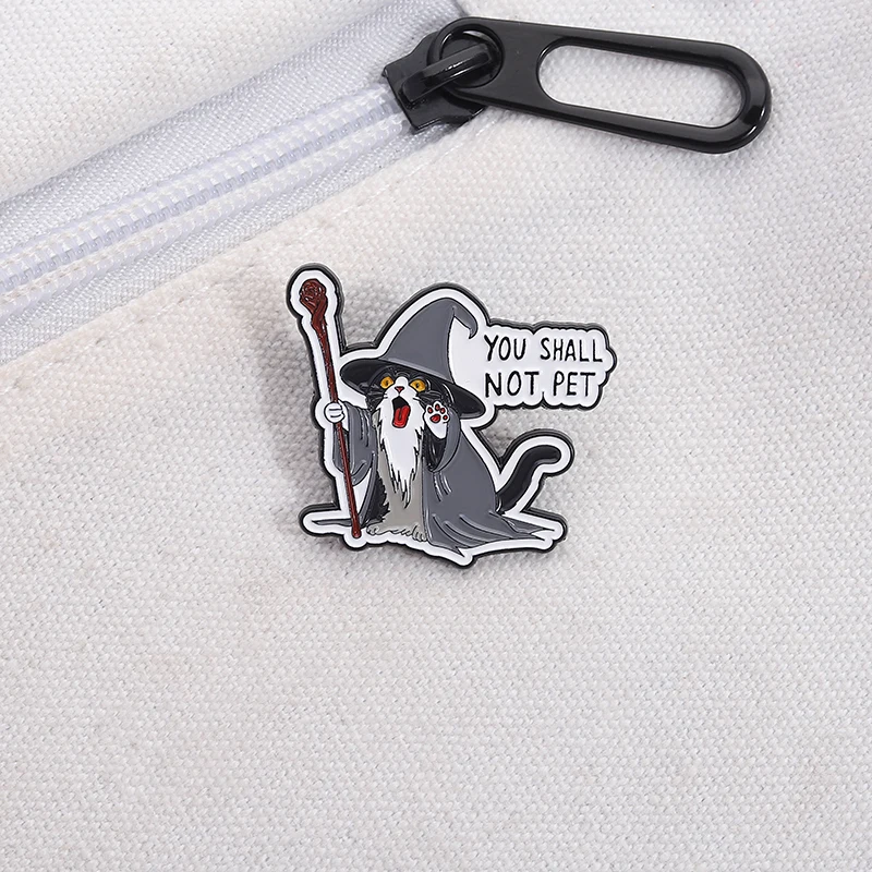 You Shall Not Pet Enamel Pin Punk Wizard Cat with Magic Wand Brooch Clothes Hat Lapel Badge Decoration Jewelry Gift for Friend
You Shall Not Pet Enamel Pin Punk Wizard Cat with Magic Wand Brooch Clothes Hat Lapel Badge Decoration Jewelry Gift for Friend