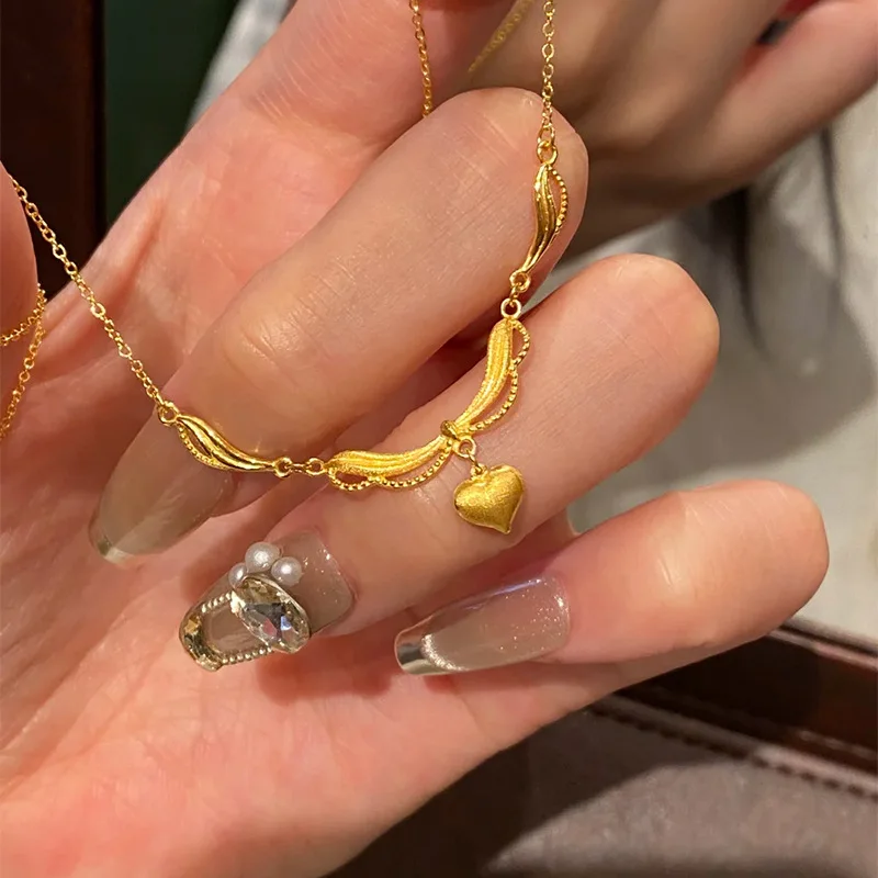Minimally frosted antique gold craftsm heart-shaped lace collares chain vintage light luxury exquisite necklace banquet jewelry
Minimally frosted antique gold craftsm heart-shaped lace collares chain vintage light luxury exquisite necklace banquet jewelry