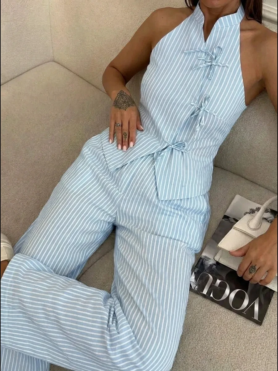 KT 2026 New Women's Striped Two-Piece Set, Halter Neck Frog Button Sleeveless Top & High Waist Wide Leg Pants
KT 2026 New Women's Striped Two-Piece Set, Halter Neck Frog Button Sleeveless Top & High Waist Wide Leg Pants