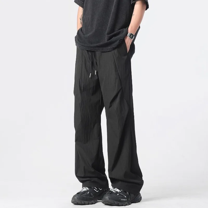 Men's Black Elastic Waist Drawstring Wide Leg Pants Quick Dry Loose Streetwear Casual Trousers
Men's Black Elastic Waist Drawstring Wide Leg Pants Quick Dry Loose Streetwear Casual Trousers