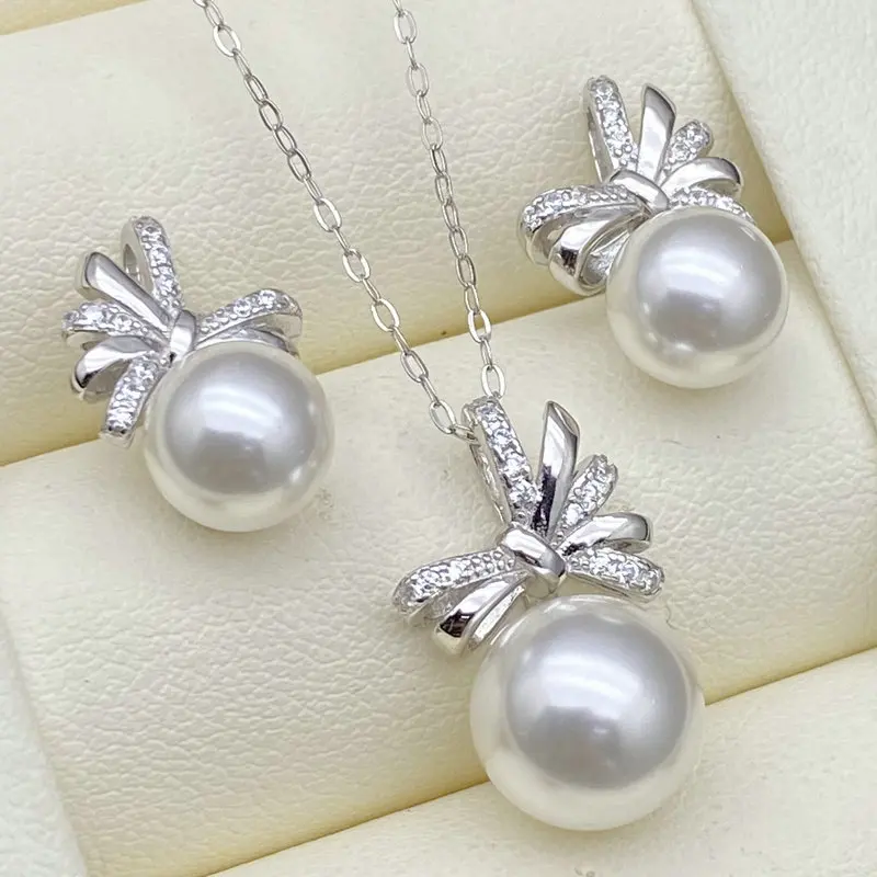 Серьги-подвески из стерлингового серебра S925 с жемчугом, в форме узла, с позолоченным основанием, новая модная бижутерия
Серьги-подвески из стерлингового серебра S925 с жемчугом, в форме узла, с позолоченным основанием, новая модная бижутерия