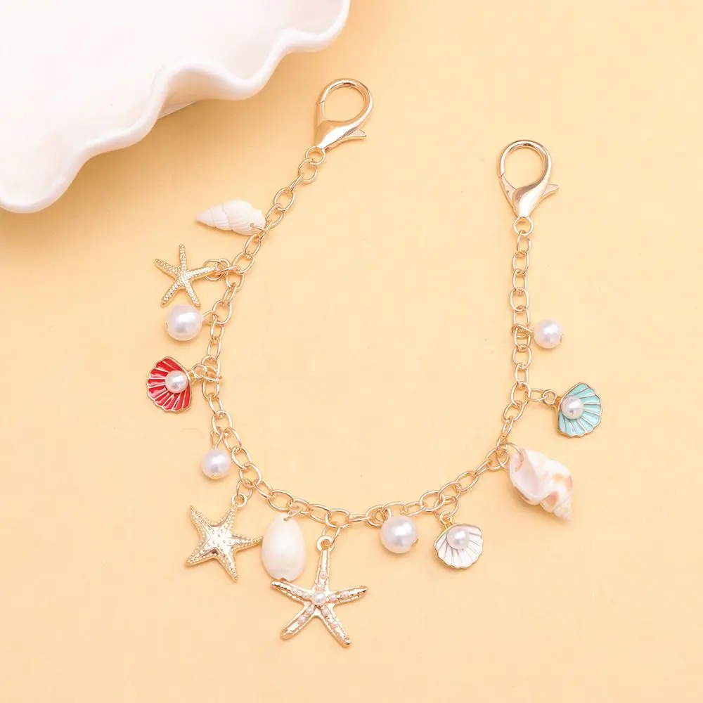 DIY Decoration Starfish Conch Pearl Bag Pendant Metal Chain Lanyard Bag Charms Accessory Bohemian Style Fashion Bag Chain Women
DIY Decoration Starfish Conch Pearl Bag Pendant Metal Chain Lanyard Bag Charms Accessory Bohemian Style Fashion Bag Chain Women