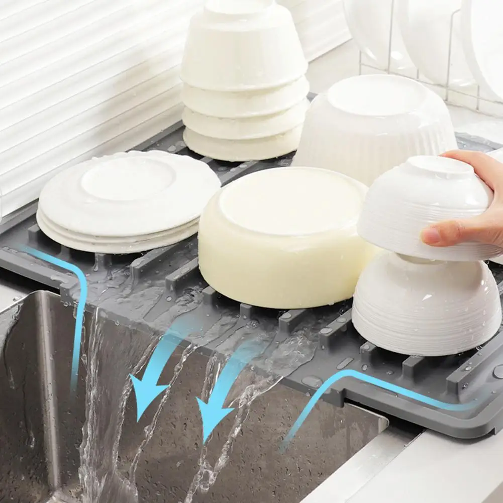 Sink Mat Silicone Sink Drain Mat Non-slip Heat Resistant Cutlery Holder Flexible Thick Dish Drying Mat with Slope Drainage
Sink Mat Silicone Sink Drain Mat Non-slip Heat Resistant Cutlery Holder Flexible Thick Dish Drying Mat with Slope Drainage