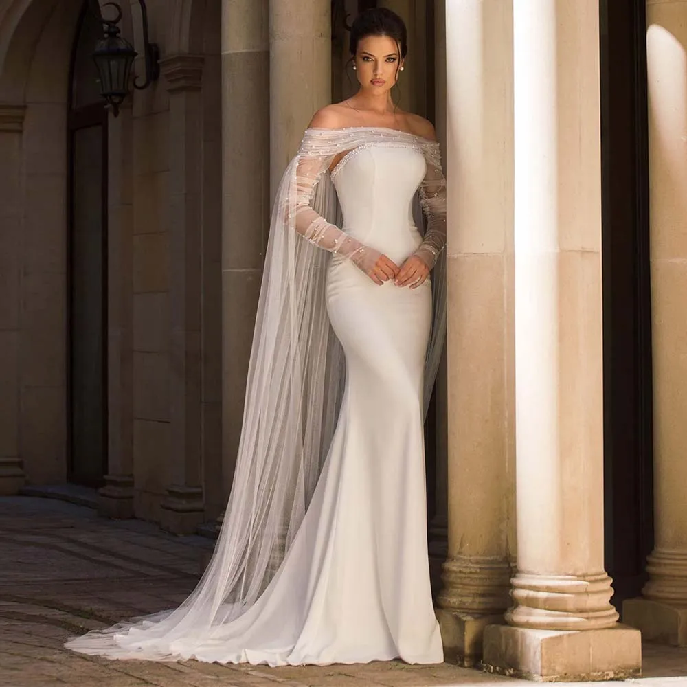 Customized Strapless Mermaid Beach Wedding Dress Off Shoulder Pearl Detailing Detachable Cape Detachable Skirt Tulle Bridal Gown
Customized Strapless Mermaid Beach Wedding Dress Off Shoulder Pearl Detailing Detachable Cape Detachable Skirt Tulle Bridal Gown