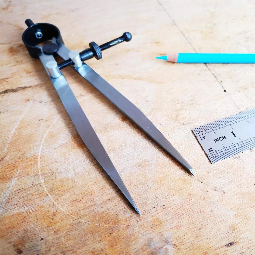 A98T6-дюймовый регулируемый запираемый стальной разделитель с крыльями, кожаный компас
A98T6-дюймовый регулируемый запираемый стальной разделитель с крыльями, кожаный компас