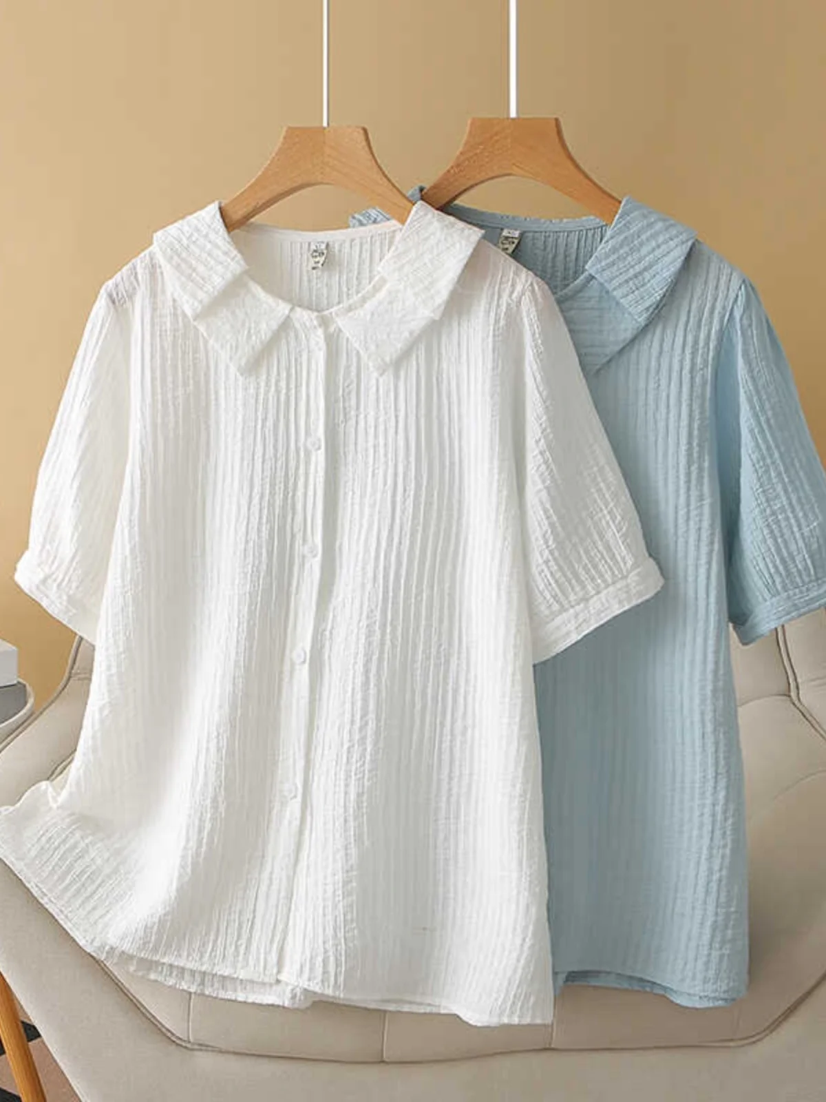 Summer Large Size 200 Pounds Lazy Design Sense Shirt Short Sleeve Doll Collar Loose Anti-aging Top Korean Style Bubble ...
Summer Large Size 200 Pounds Lazy Design Sense Shirt Short Sleeve Doll Collar Loose Anti-aging Top Korean Style Bubble ...
