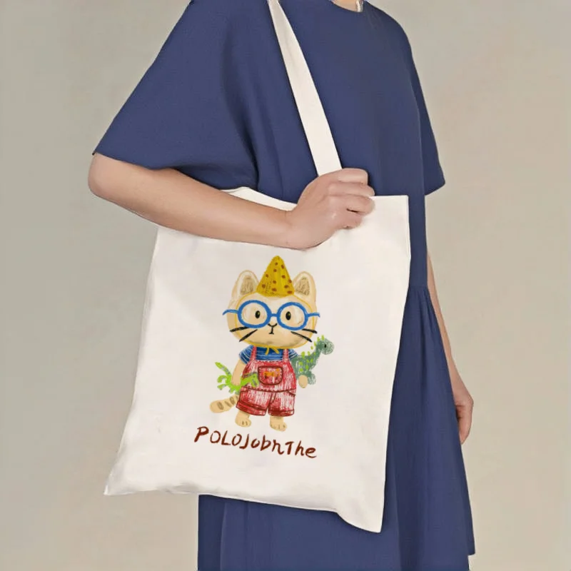1pc Cartoon Cat & Dinosaur Print Canvas Tote Bag, Double-sided Casual Shoulder Handbag
1pc Cartoon Cat & Dinosaur Print Canvas Tote Bag, Double-sided Casual Shoulder Handbag