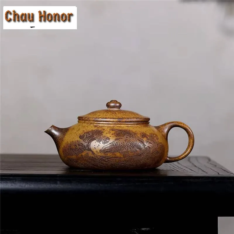 180ml Ancient Yixing Purple Clay Teapots Handmade Fish Play Pot Raw Ore Wood-fired Section Mud Kettle Zisha Tea Set Collection
180ml Ancient Yixing Purple Clay Teapots Handmade Fish Play Pot Raw Ore Wood-fired Section Mud Kettle Zisha Tea Set Collection