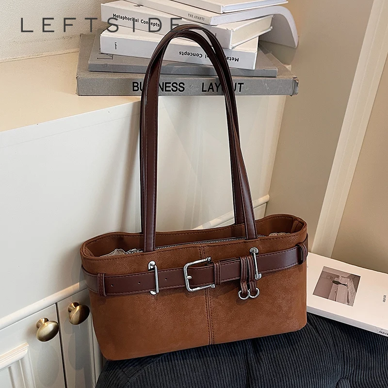 Левая сторона, женская маленькая сумка на плечо из искусственной замши, новинка зимы 2021, ретро сумка подмышки, роскошные брендовые дизайнерские сумки и кошельки
Левая сторона, женская маленькая сумка на плечо из искусственной замши, новинка зимы 2021, ретро сумка подмышки, роскошные брендовые дизайнерские сумки и кошельки