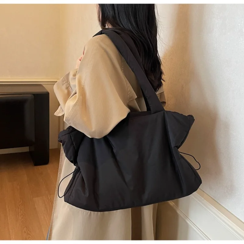 Women's Padded Nylon Tote Bag Lightweight & Spacious for Daily Casual Office Streetwear Weekend Travel Errands & Daily Use
Women's Padded Nylon Tote Bag Lightweight & Spacious for Daily Casual Office Streetwear Weekend Travel Errands & Daily Use