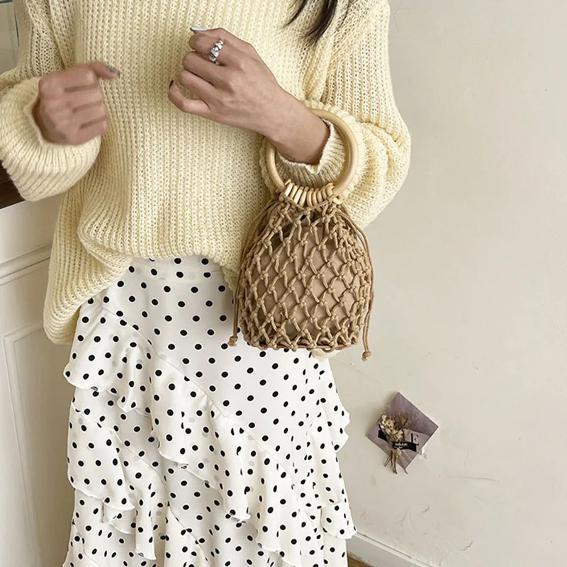 Women's Hand Woven Circular Handbag Spring Summer French Casual Fashion Vacation Style Simple Drawstring Hollow Out Bucket Bag
Women's Hand Woven Circular Handbag Spring Summer French Casual Fashion Vacation Style Simple Drawstring Hollow Out Bucket Bag