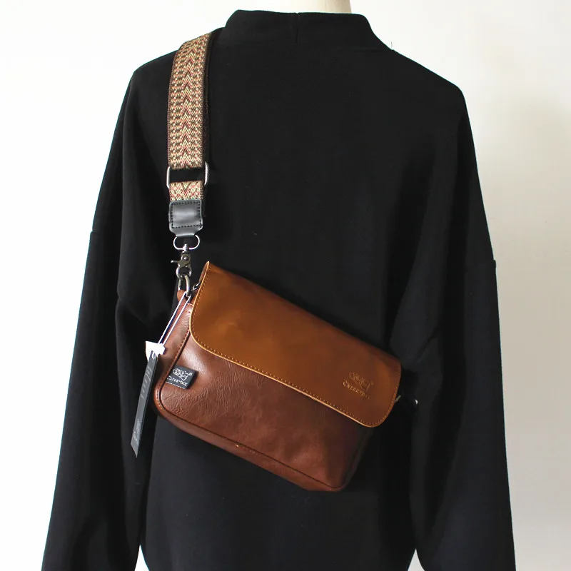 Fashionable Rainbow Strap Men's Crossbody Bag Street Style Youth Backpack Single Shoulder Bag Soft PU Leather Zipper Closure
Fashionable Rainbow Strap Men's Crossbody Bag Street Style Youth Backpack Single Shoulder Bag Soft PU Leather Zipper Closure