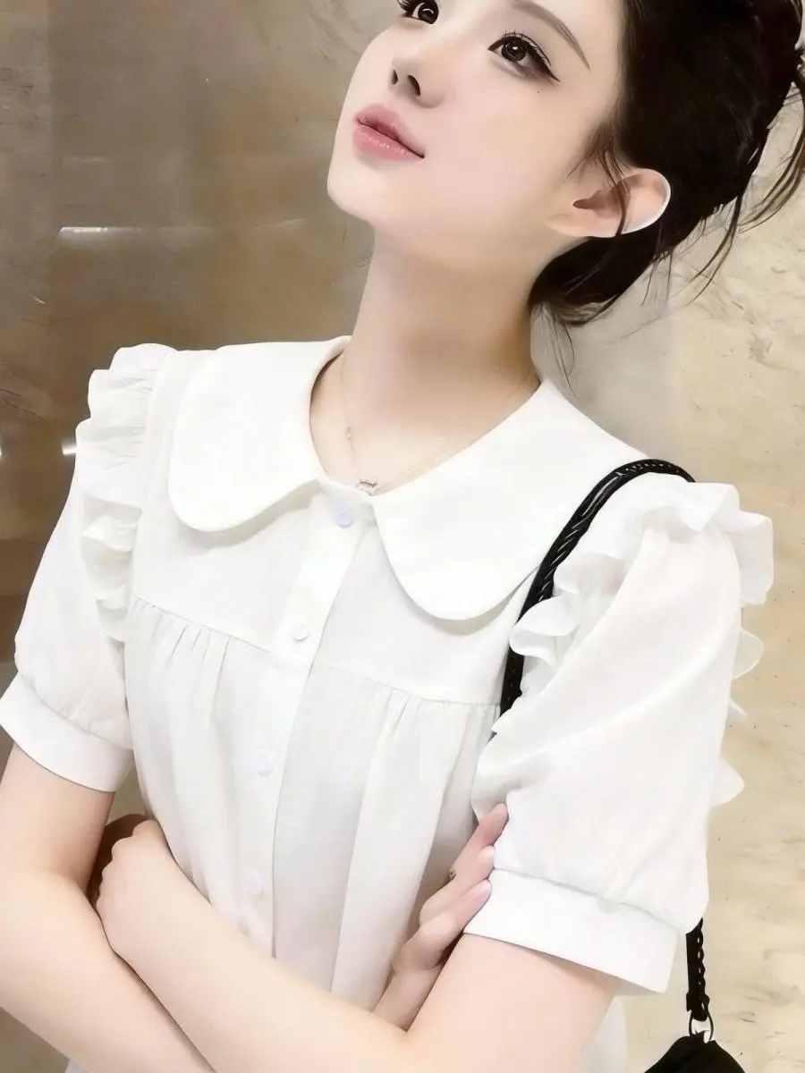 Cute Doll Short Sleeve Shirt Summer New Style Elegant Loose Ear Clip Sweet Top Women's Fashion Sweet Style Bubble Sleeve Shirt
Cute Doll Short Sleeve Shirt Summer New Style Elegant Loose Ear Clip Sweet Top Women's Fashion Sweet Style Bubble Sleeve Shirt