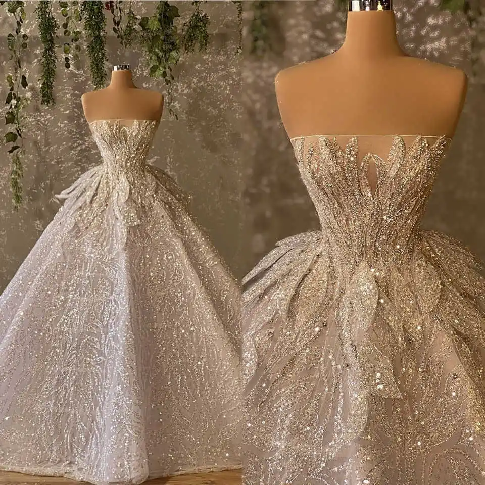 Luxury A Line Women Wedding Dress Strapless Sleeveless Bridal Gowns Appliques Sequins Sweep Train Dress Custom Made vestidos 
Luxury A Line Women Wedding Dress Strapless Sleeveless Bridal Gowns Appliques Sequins Sweep Train Dress Custom Made vestidos