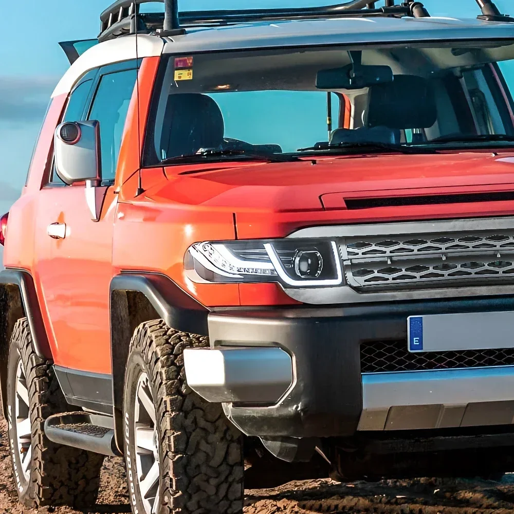 Для Toyota FJ Cruiser 2007-2017 автомобильный передний фонарь, обновленный Land Rover, дизайн, аксессуары для линз проектора, светодиодные автомобильные фары в сборе
Для Toyota FJ Cruiser 2007-2017 автомобильный передний фонарь, обновленный Land Rover, дизайн, аксессуары для линз проектора, светодиодные автомобильные фары в сборе