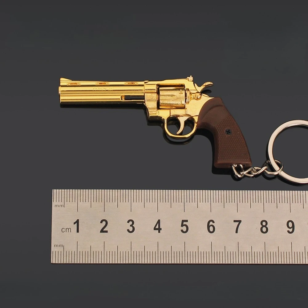 Hot 1:3 Mini Alloy Revolver Gun Model Metal Keychain Removable Decompression Toy Ornament Men's Gift
Hot 1:3 Mini Alloy Revolver Gun Model Metal Keychain Removable Decompression Toy Ornament Men's Gift