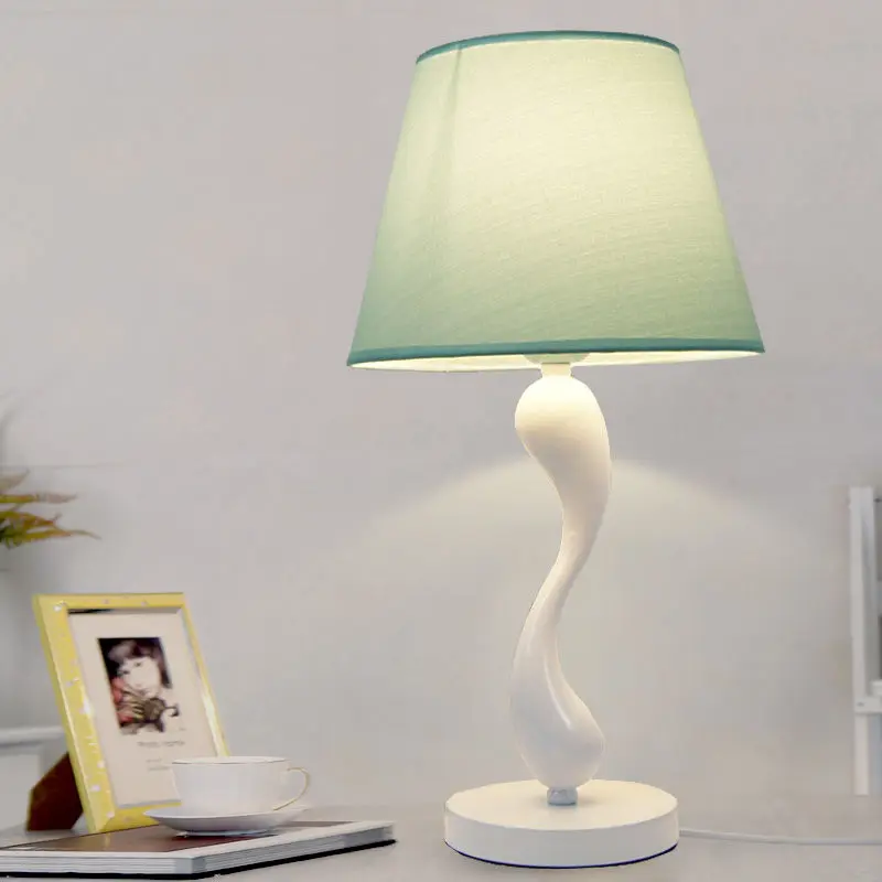 Modern simple and fashionable bedroom study bedside table lamp creative blue fabric remote control lighting fixture
Modern simple and fashionable bedroom study bedside table lamp creative blue fabric remote control lighting fixture