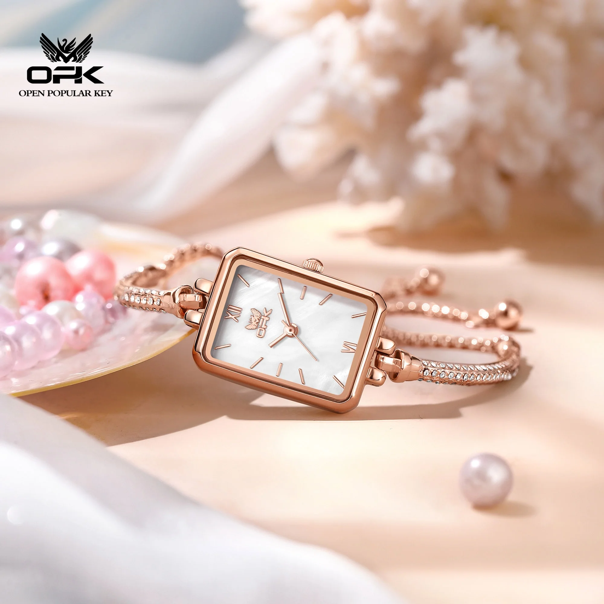 OPK brand new exquisite and elegant half bracelet style small square watch for women, waterproof quartz watch 6092
OPK brand new exquisite and elegant half bracelet style small square watch for women, waterproof quartz watch 6092