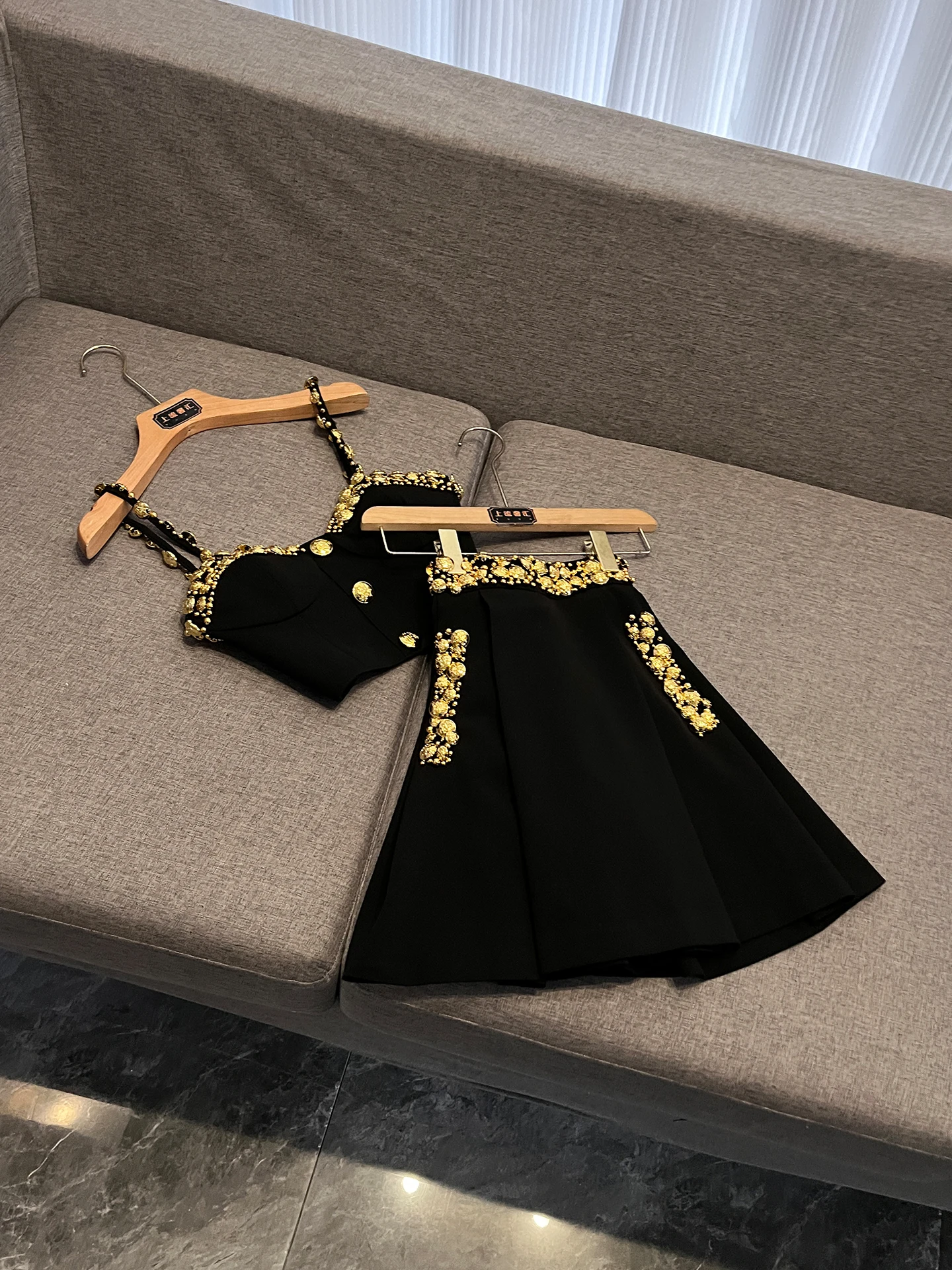 Luxury Style Fashion Heavy Embellished Gold Button Decorated Strap Vest Skirt Set Celebrity Inspired Short Sleeve Button up
Luxury Style Fashion Heavy Embellished Gold Button Decorated Strap Vest Skirt Set Celebrity Inspired Short Sleeve Button up