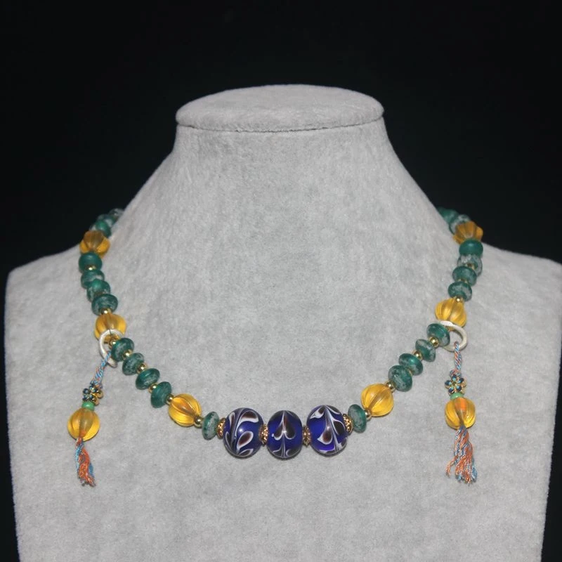 Imitation Ming Dynasty antique green glass disc paired with tail abacus beads necklace collarbone chain
Imitation Ming Dynasty antique green glass disc paired with tail abacus beads necklace collarbone chain