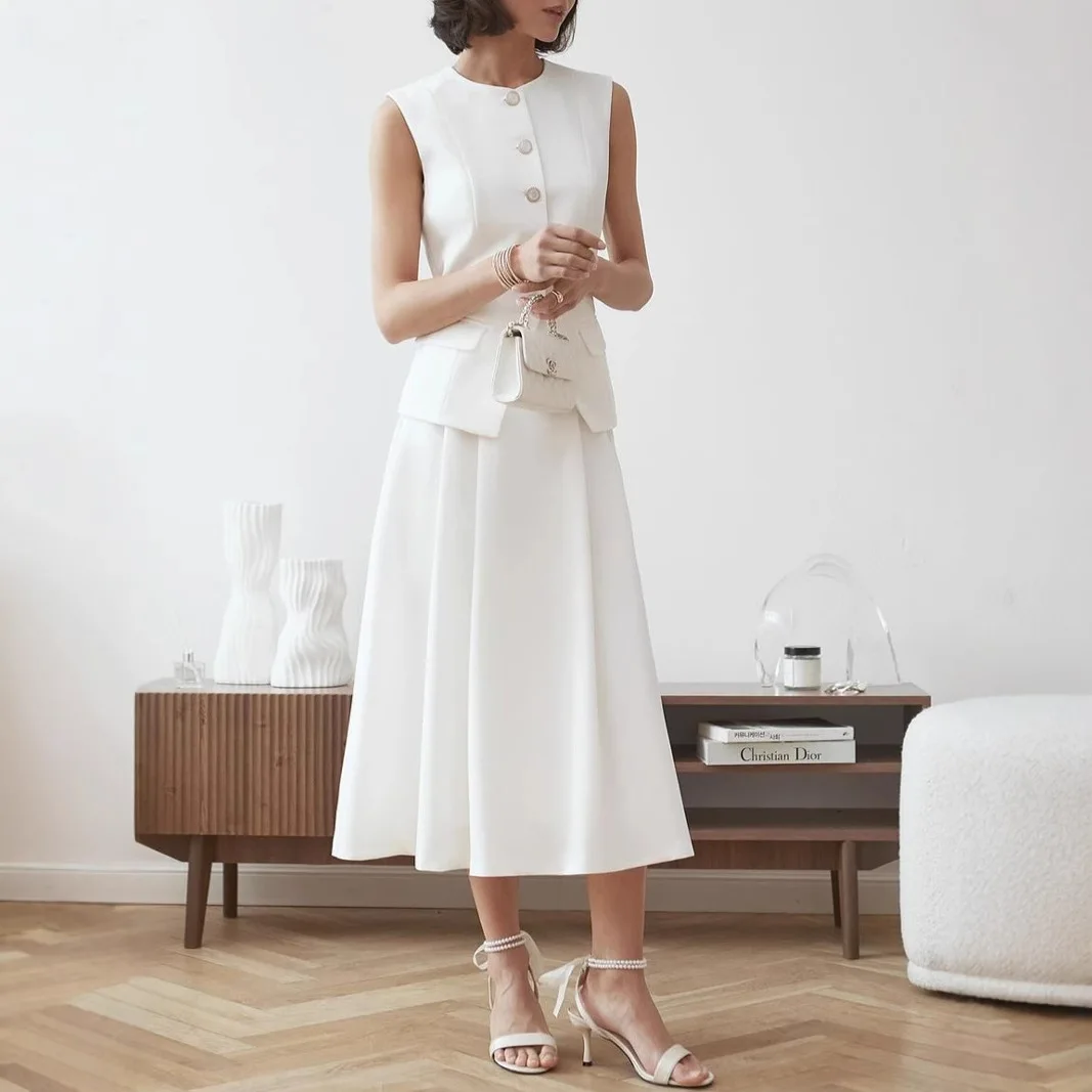 Simple and high-end 2025 summer white fashion suit new button sleeveless suit vest high waist skirt club clothing Vestidos
Simple and high-end 2025 summer white fashion suit new button sleeveless suit vest high waist skirt club clothing Vestidos