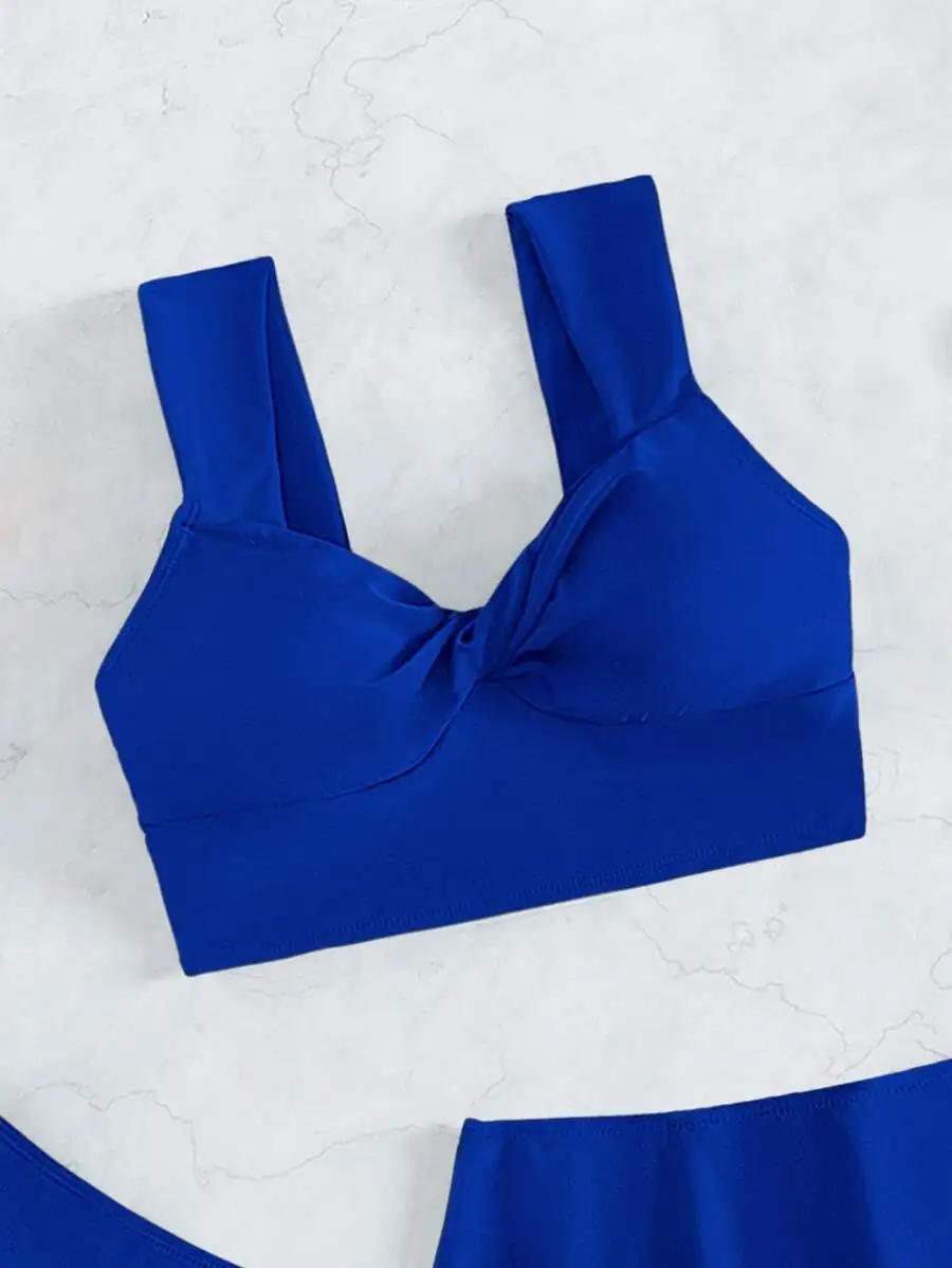 Blue Twist Front Bikini Top With Ruffle Trim And Beach Skirt Set
Blue Twist Front Bikini Top With Ruffle Trim And Beach Skirt Set