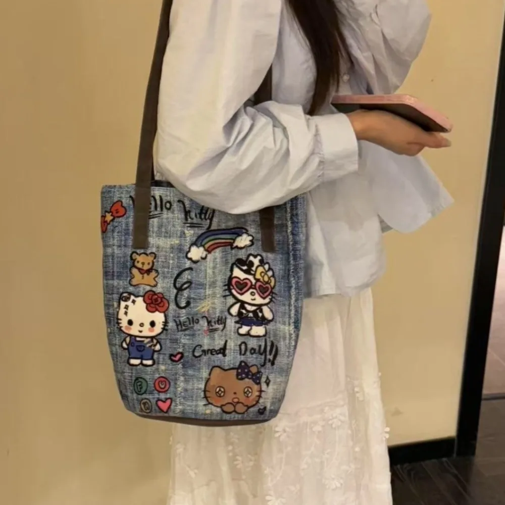 Hello Kitty Bucket Bag Cute Cartoon Originality Illustration High-capacity Shoulder Bag Fashion Delicate Personality Denim Bag
Hello Kitty Bucket Bag Cute Cartoon Originality Illustration High-capacity Shoulder Bag Fashion Delicate Personality Denim Bag