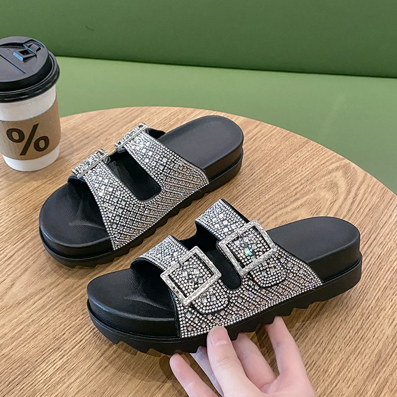 New Rhinestone Toe Exposed Thick Soled Slippers for Women's Outdoor Wear with Belt Buckle and Hollowed Out Beach Sandals
New Rhinestone Toe Exposed Thick Soled Slippers for Women's Outdoor Wear with Belt Buckle and Hollowed Out Beach Sandals