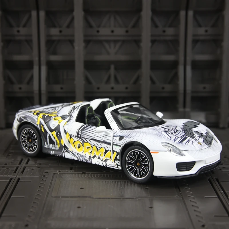 CCA 1:24 simulation Porsche 918 Spyder alloy supercar model, doors can be opened has simulated sound and lighting functions
CCA 1:24 simulation Porsche 918 Spyder alloy supercar model, doors can be opened has simulated sound and lighting functions