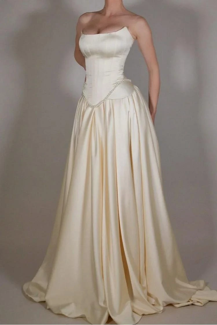 Elegant Ivory Satin Spaghetti Strap A-Line Maxi Dress Pleated Skirt Lace Detail Slim Fit Evening Formal Prom Dress for Women
Elegant Ivory Satin Spaghetti Strap A-Line Maxi Dress Pleated Skirt Lace Detail Slim Fit Evening Formal Prom Dress for Women