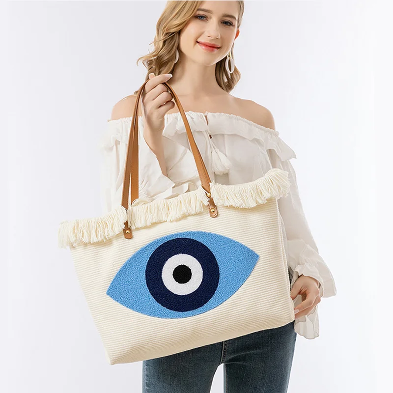 2025 New Fashion Tassel Towel Embroidered Eye Large Capacity Tote Women Travel Beach Bag Lady Trendy Shopper Handbags
2025 New Fashion Tassel Towel Embroidered Eye Large Capacity Tote Women Travel Beach Bag Lady Trendy Shopper Handbags