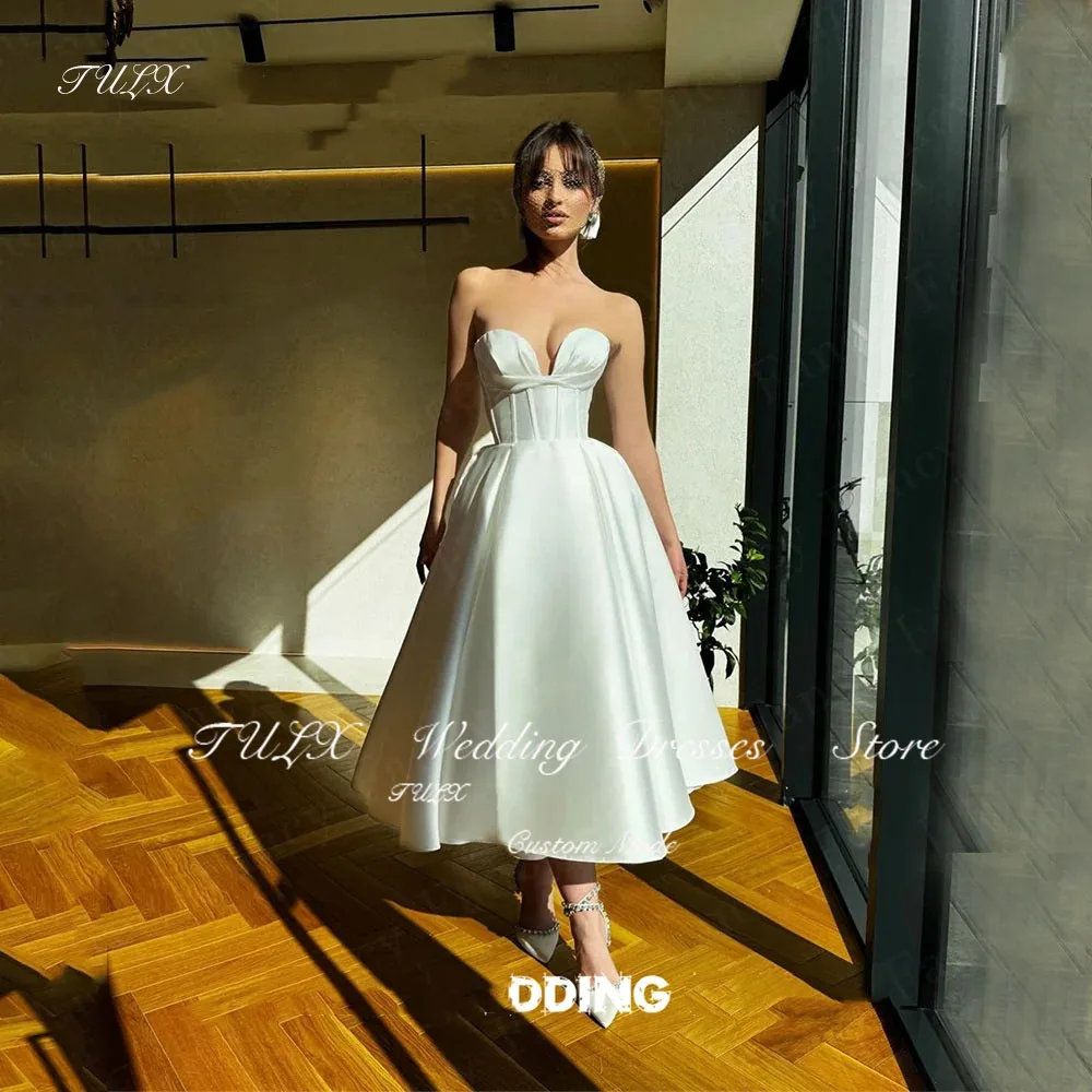 TULX Sweetheart Satin Wedding Dress Saudi Arabia A Line Sleeveless Sexy Bridal Gown Tea Length Evening Party Dresses Back Zip
TULX Sweetheart Satin Wedding Dress Saudi Arabia A Line Sleeveless Sexy Bridal Gown Tea Length Evening Party Dresses Back Zip