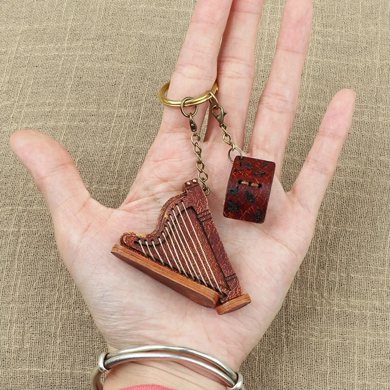 Leather Mini Harp Keychain Pendant Bag Pendant Cowhide Handmade Pendant Retro Concert Commemorative Gift
Leather Mini Harp Keychain Pendant Bag Pendant Cowhide Handmade Pendant Retro Concert Commemorative Gift