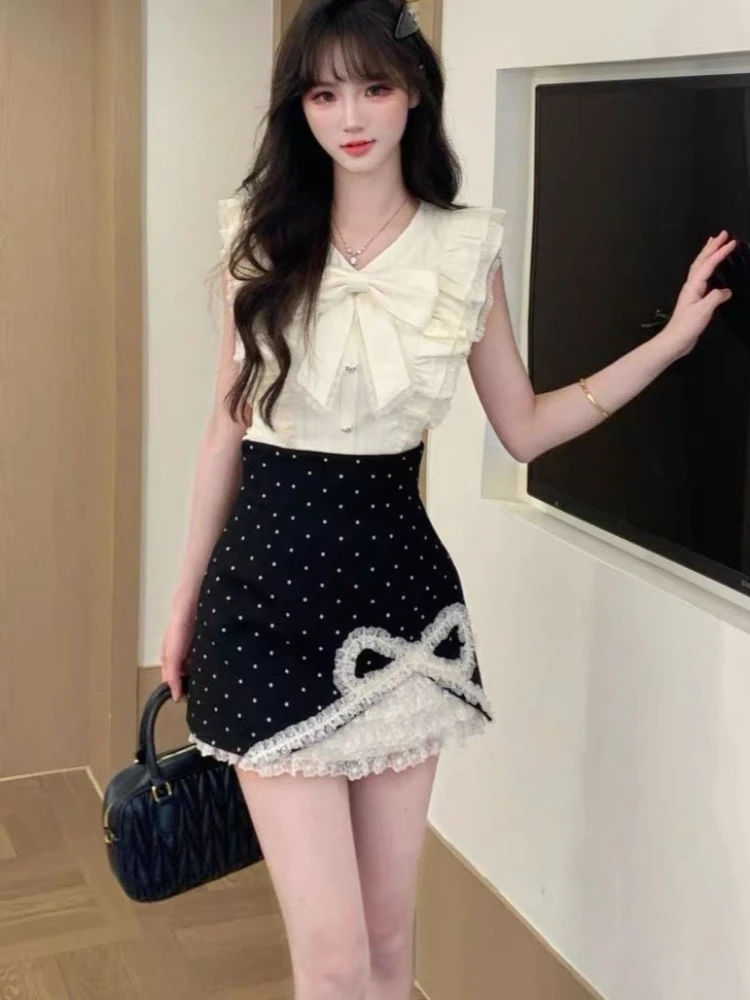 French Elegant Sleeveless High Waist Polka Dot 2 Piece Sets Women Bow Ruffle Lace Tops Mini Skirt Suits Sweet Daily Party Outfit
French Elegant Sleeveless High Waist Polka Dot 2 Piece Sets Women Bow Ruffle Lace Tops Mini Skirt Suits Sweet Daily Party Outfit