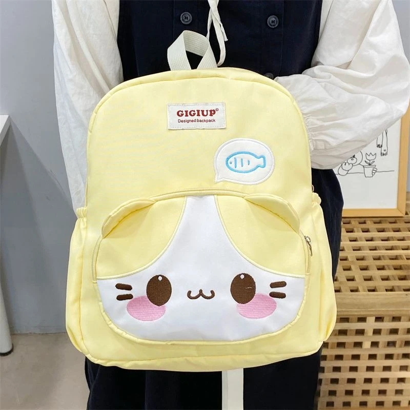 Японский мультяшный милый желтый кот, большой вместительный рюкзак Kawaii, студенческая сумка для хранения учебников, школьная сумка, женская сумка
Японский мультяшный милый желтый кот, большой вместительный рюкзак Kawaii, студенческая сумка для хранения учебников, школьная сумка, женская сумка