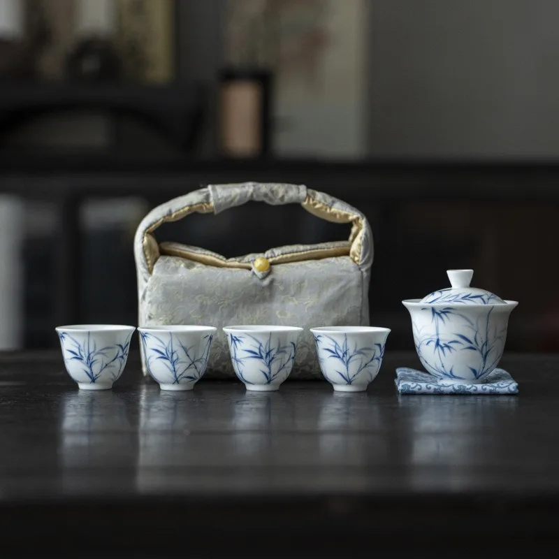 Jade Mud White Porcelain Hand-painted Bamboo One Covered Bowl Four Cups Outdoor Travel Tea Set Cloth Bag Storage Bag Tea
Jade Mud White Porcelain Hand-painted Bamboo One Covered Bowl Four Cups Outdoor Travel Tea Set Cloth Bag Storage Bag Tea