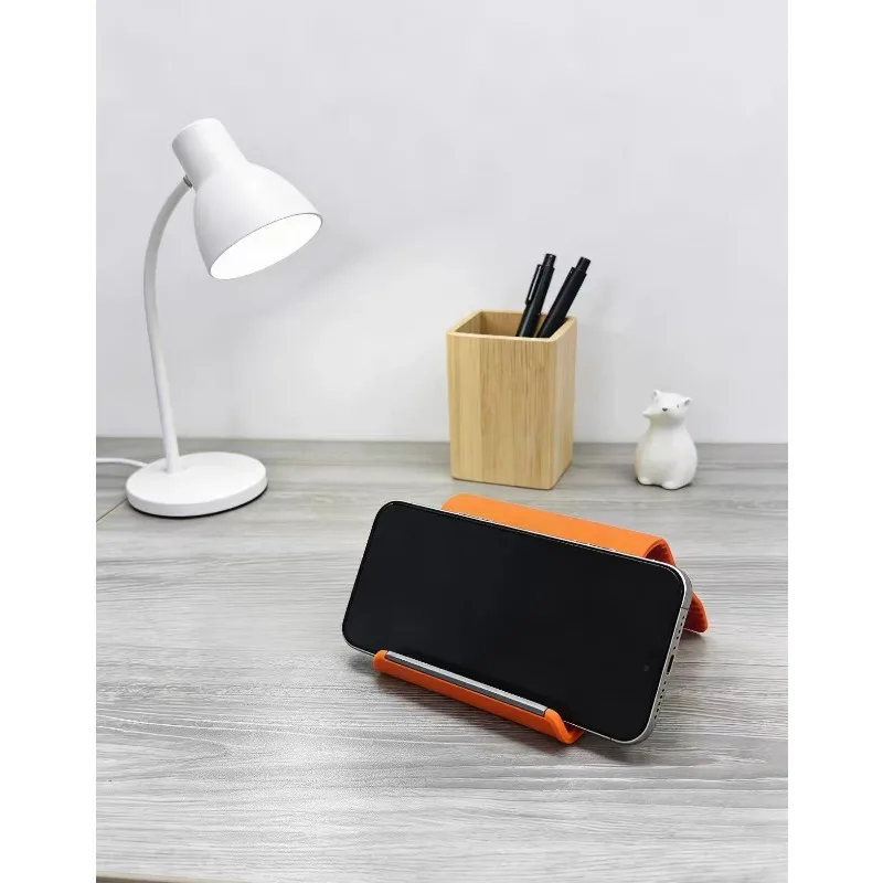 Mobile phone Portable Foldable Silicone, Bendable Freely into Any Shape, Multi-Angle Adjustable Stand for Mobile Phone Devices
Mobile phone Portable Foldable Silicone, Bendable Freely into Any Shape, Multi-Angle Adjustable Stand for Mobile Phone Devices