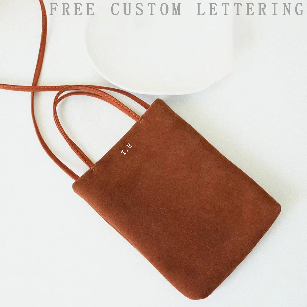 First layer cowhide women's mobile phone bag 2025 new niche design suede vintage simple mini fashion one-shoulder crossbody bag
First layer cowhide women's mobile phone bag 2025 new niche design suede vintage simple mini fashion one-shoulder crossbody bag