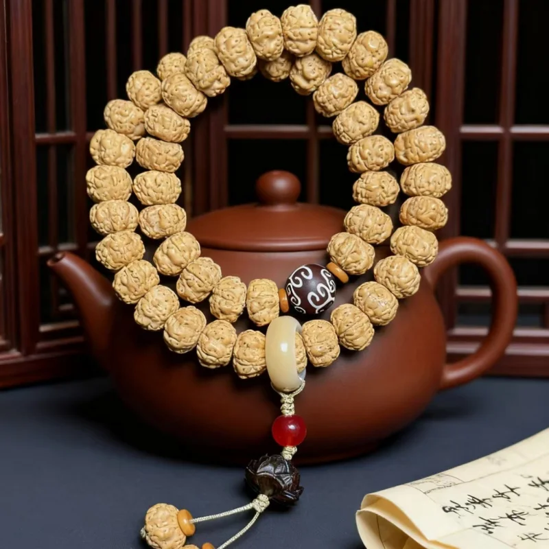 Natural small Rudraksha beads hand bracelet with lotus design, double-loop, suitable for both men and women, Buddhist prayer bea
Natural small Rudraksha beads hand bracelet with lotus design, double-loop, suitable for both men and women, Buddhist prayer bea