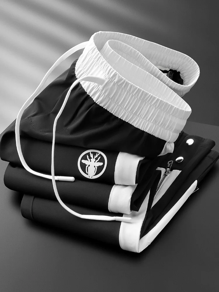 Летние мужские спортивные брюки из ледяного шелка с контрастными вставками, быстросохнущие, на молнии, прямого кроя, повседневные
Летние мужские спортивные брюки из ледяного шелка с контрастными вставками, быстросохнущие, на молнии, прямого кроя, повседневные