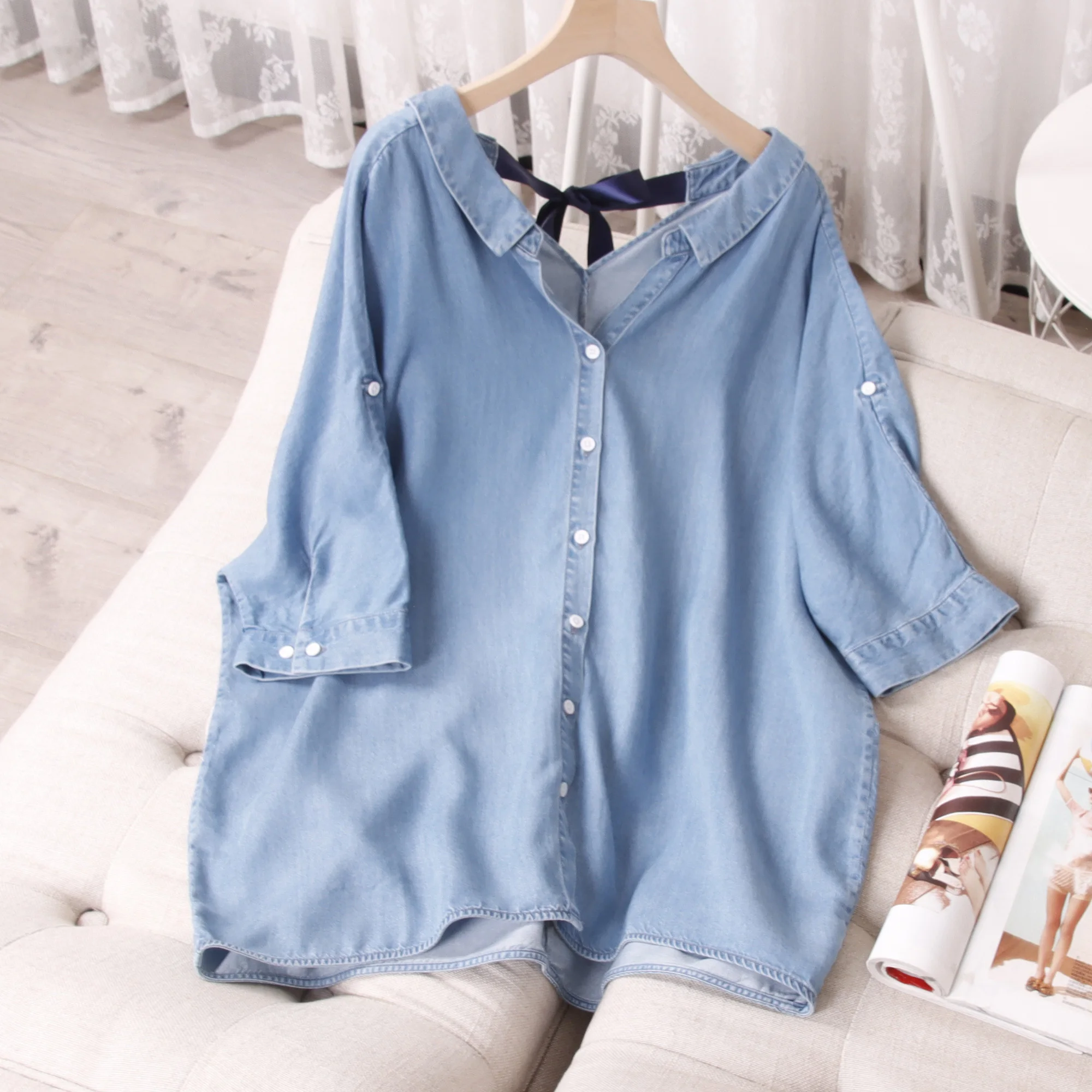 V-neck three-quarter sleeve denim shirt for women with tie-back design soft and skin-friendly loose shirt
V-neck three-quarter sleeve denim shirt for women with tie-back design soft and skin-friendly loose shirt