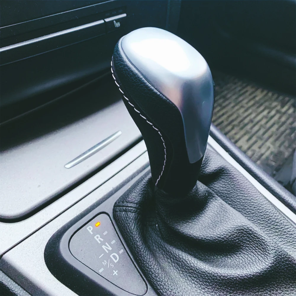 Para BMW E81 E82 E87 E90 E92 E93 Perilla palanca cambios automática con Alcantara
Para BMW E81 E82 E87 E90 E92 E93 Perilla palanca cambios automática con Alcantara