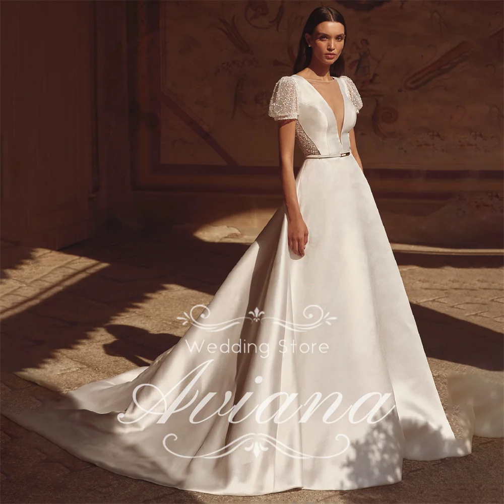 Aviana Customized V-Neck Wedding Dress Sweep Train Backless Pearls Beading Floor Length Short Sleeve A-Line Sequin Morden New
Aviana Customized V-Neck Wedding Dress Sweep Train Backless Pearls Beading Floor Length Short Sleeve A-Line Sequin Morden New