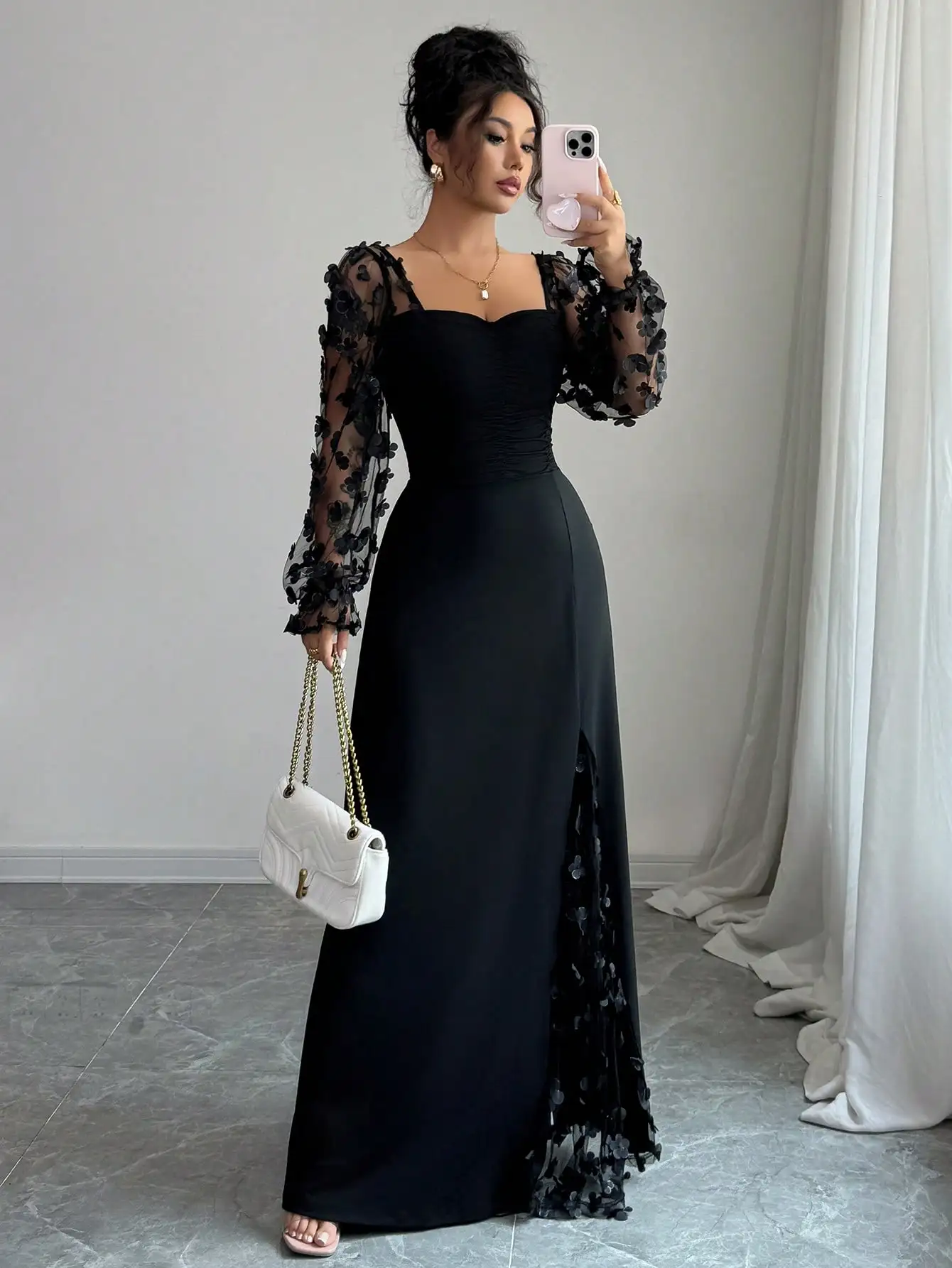 Black Long Sleeve Evening Gown with Floral Mesh Sleeves and Side Slit
Black Long Sleeve Evening Gown with Floral Mesh Sleeves and Side Slit