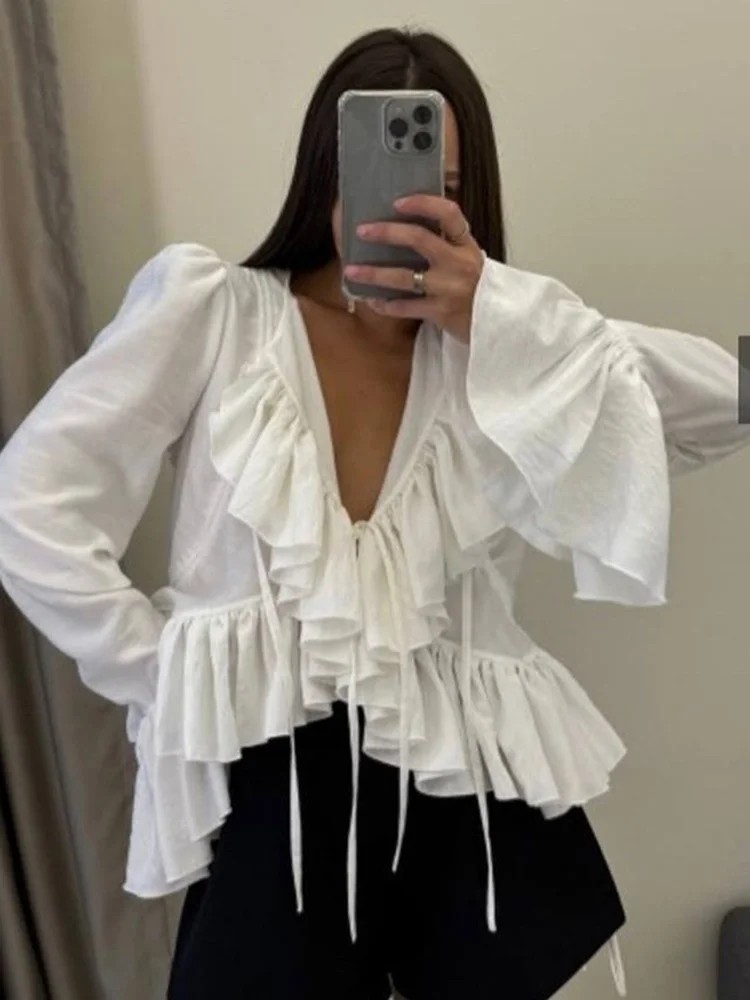 Женская блузка Fantoye с V-образным вырезом, оборками и шнуровкой, белая, с расклешенными рукавами, укороченная, весенняя, свободная, элегантная, офисная одежда для женщин 2026
Женская блузка Fantoye с V-образным вырезом, оборками и шнуровкой, белая, с расклешенными рукавами, укороченная, весенняя, свободная, элегантная, офисная одежда для женщин 2026