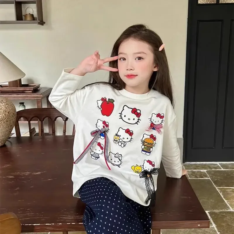 Футболка с бантом в стиле аниме «Hello Kitty» для девочек, кавайная весенне-осенняя новая футболка Sanrio с белым принтом и длинными рукавами, модная универсальная
Футболка с бантом в стиле аниме «Hello Kitty» для девочек, кавайная весенне-осенняя новая футболка Sanrio с белым принтом и длинными рукавами, модная универсальная