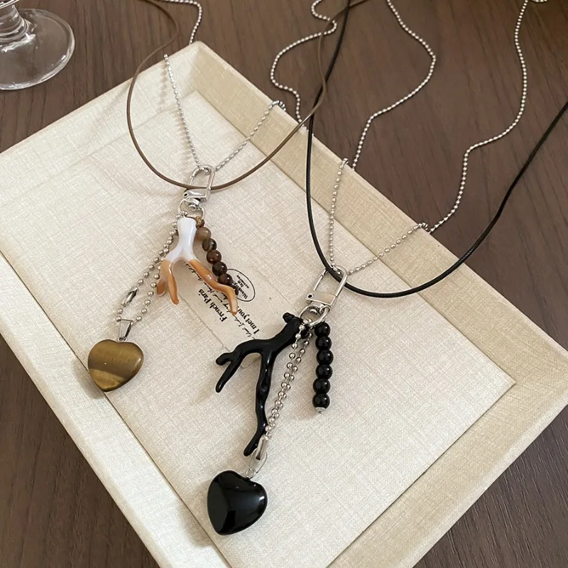 Minar 2025 New Natural Stone Tiger Eyes Heart Resin Crotch Pendant Necklaces for Women Double Layered Rope Sweater Chain Choker
Minar 2025 New Natural Stone Tiger Eyes Heart Resin Crotch Pendant Necklaces for Women Double Layered Rope Sweater Chain Choker