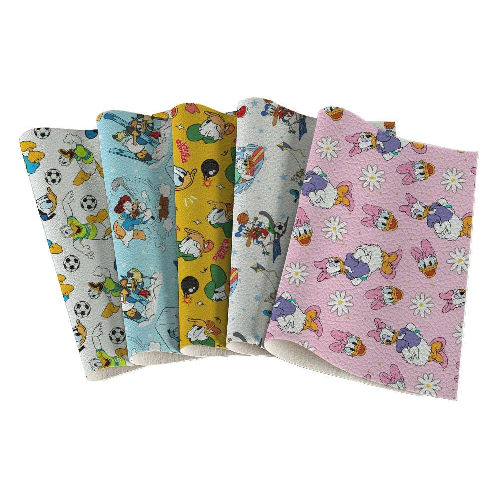 Disney Cartoon Donald Duck Pattern Artificial Lychee Leather Pattern for DIY Hair Bow Craft Making Leather Roll 11.8*53.5"
Disney Cartoon Donald Duck Pattern Artificial Lychee Leather Pattern for DIY Hair Bow Craft Making Leather Roll 11.8*53.5"