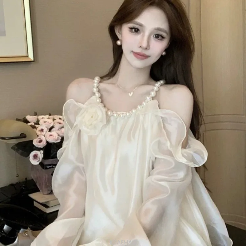 2025 Women 3d Floral Pearl Ladies Neckline Off Shoulder Blouse Ladies Solid Color French Vintage Chic Designer Look Fashionable
2025 Women 3d Floral Pearl Ladies Neckline Off Shoulder Blouse Ladies Solid Color French Vintage Chic Designer Look Fashionable