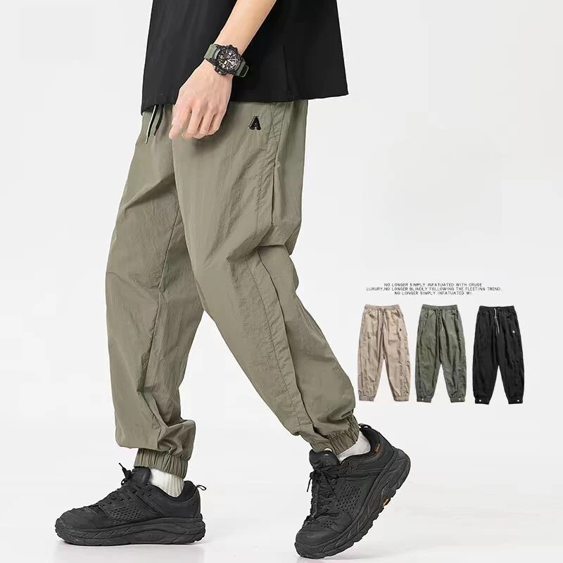 Spring Summer Fashion Casual Lightweight Pans for Men Streetwear Solid Color Cargo Pants Elastic Waist Wide Leg Men's Joggers
Spring Summer Fashion Casual Lightweight Pans for Men Streetwear Solid Color Cargo Pants Elastic Waist Wide Leg Men's Joggers
